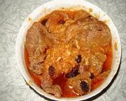 Bistec con tomate y cebolla